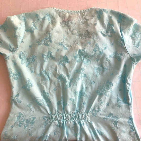 KOI turquoise scrub uniform top. Butterfly print & embroidery. Size XS - Picture 8 of 9
